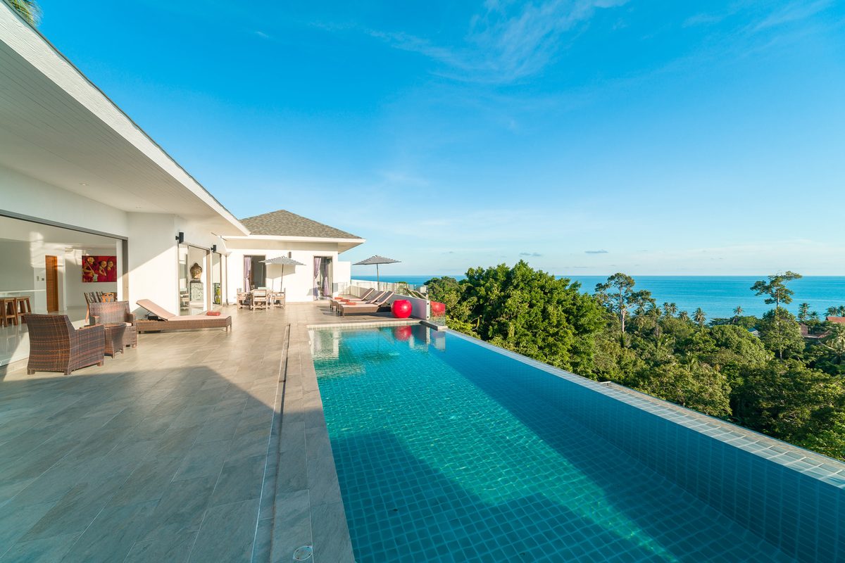 Poolside loungers overlooking the ocean